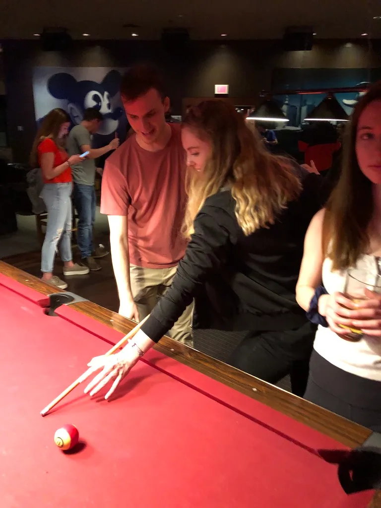 Natalie and Tyler playing pool at Jillian's near Fenway in Boston.
